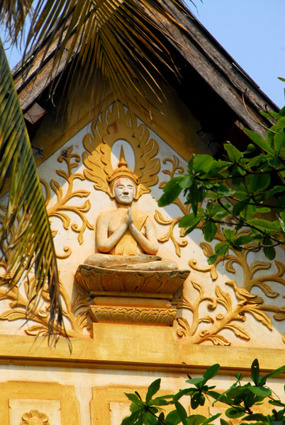 House in Luang Prabang with a Buddha