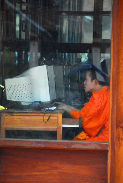 Monk at an internet cafe, Luang Prabang