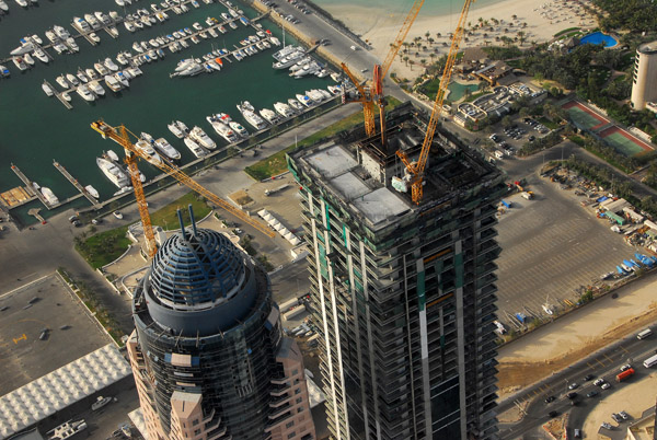 Finishing touches on the Dubai Mariott Harbour Hotel (left)