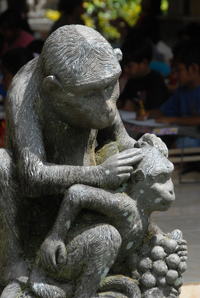 Statue of monkeys grooming