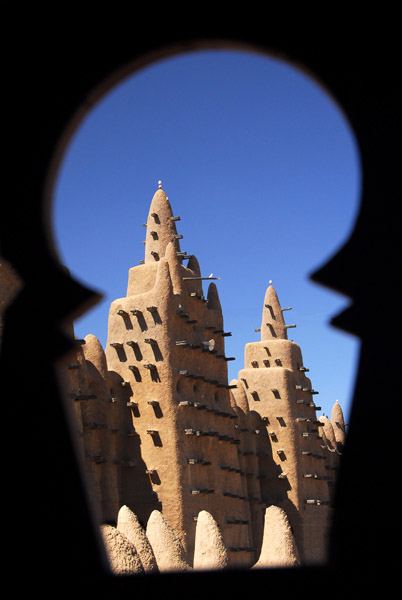 Minarets through an ornate window