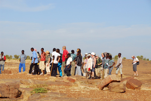 Our expedition departs for the one hour hike to the Dogon village of Tereli at the base of the escarpment