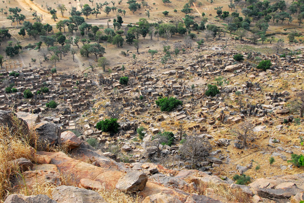 The first sight of the large Dogon village of Tereli at the base of the cliff