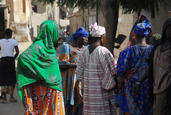 Women in colorful West African dress near the market, Mopti