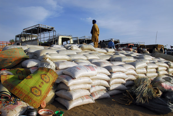 USAID sacks stacked on the quay at the Port of Korioumé, Mali