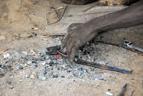 Blacksmith at work, Korioumé, Mali