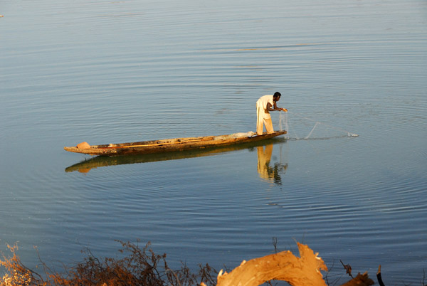 Fisherman in a West African canoe called a pirogue