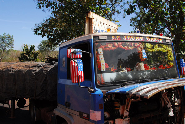 Broke down truck decorated with the American flag, Mali