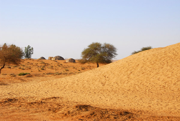 Sand dune at huts outside Haoussa Foulane, Mali
