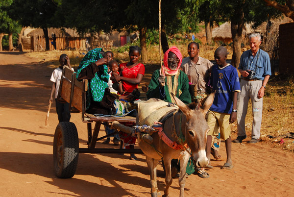 Village elder on a donkey cart