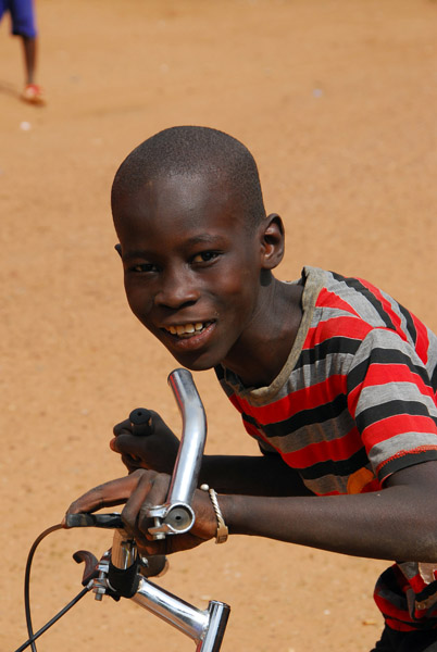 Boy on a bike, Diamou, Mali