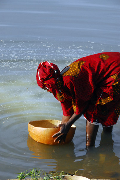 Woman rinsing millet