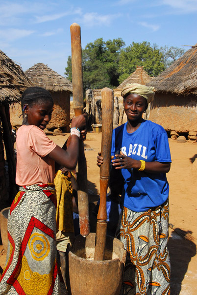 Two women grinding millet, Dilia, Mali