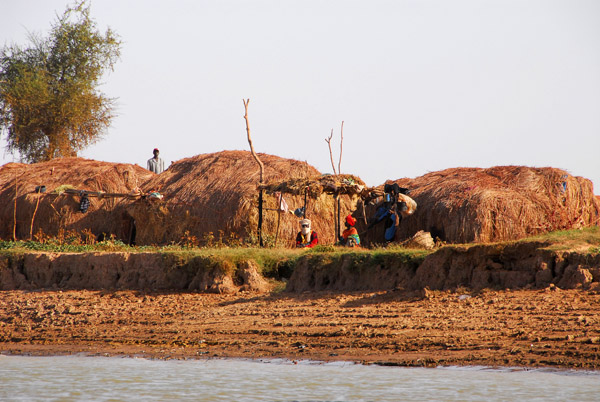 Huts of a small village on the south bank of the Niger River