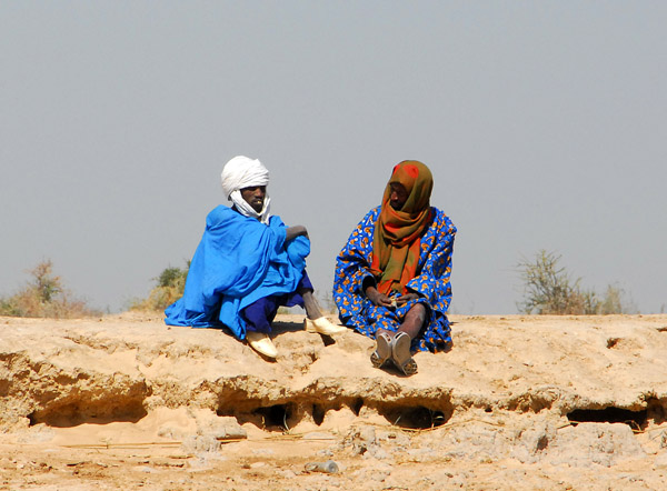 Fulani men sitting near the Niger River, Mali