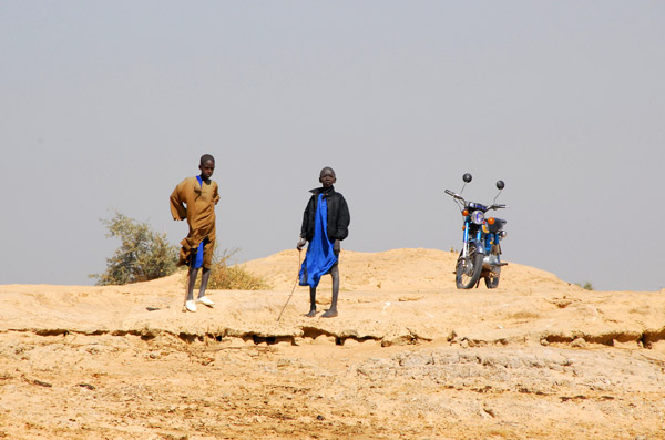 Fulani boys with a motorbike, Mali