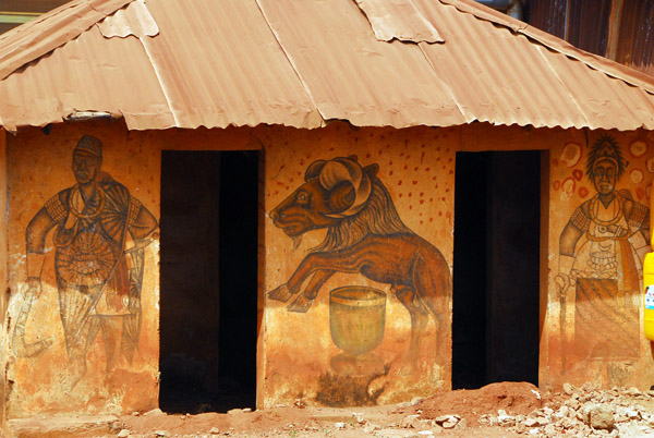 House with paintings similar to the palace bas-reliefs, Abomey