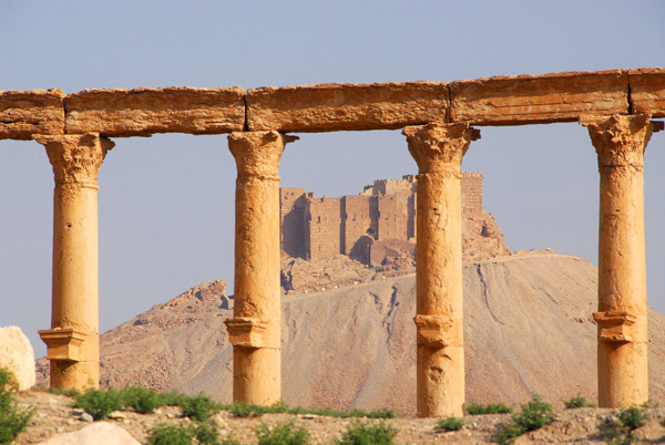 The Arab Fort through a row of columns, Palmyra