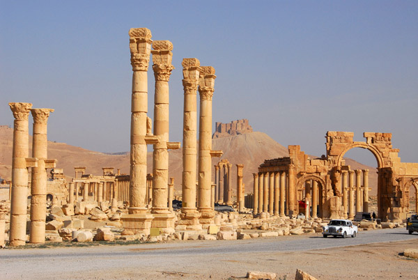 There's a road passing through the ruins of Palmyra