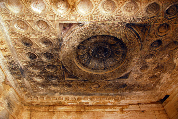 Sooty residue of centuries of cooking fires on the carved ceiling of the southern shrine