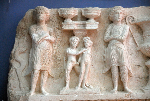 Statueof a girl grabbing a boy, Palmyra Archeological Museum