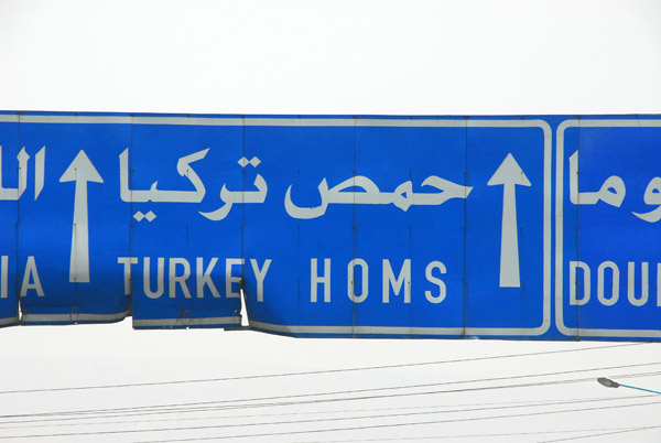 Lots of overhead signs on the Syrian roads have been hit by oversized vehicles