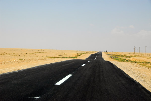 Blacktop road through the empty Syrian Desert