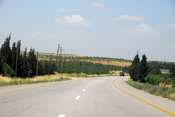 A short distance esat of Al-Fruqlos, the road enteres an more fertile region