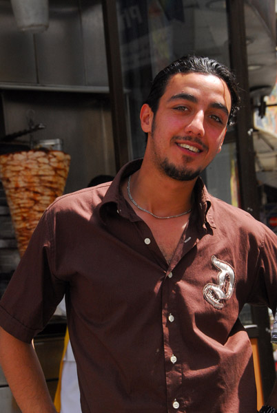 Syrian guy at a shwarma stand