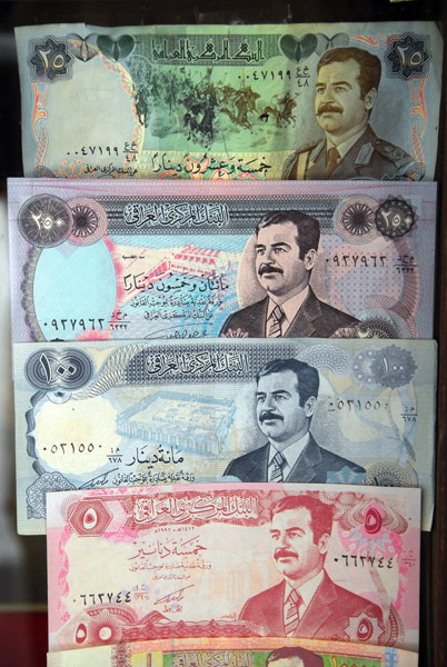 Iraqi banknotes with Saddam Hussein