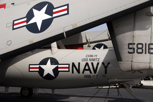 E-2 Hawkeye with wings folded on the USS Nimitz