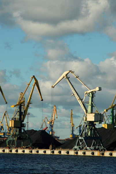 Cranes working coal at the Port of Riga
