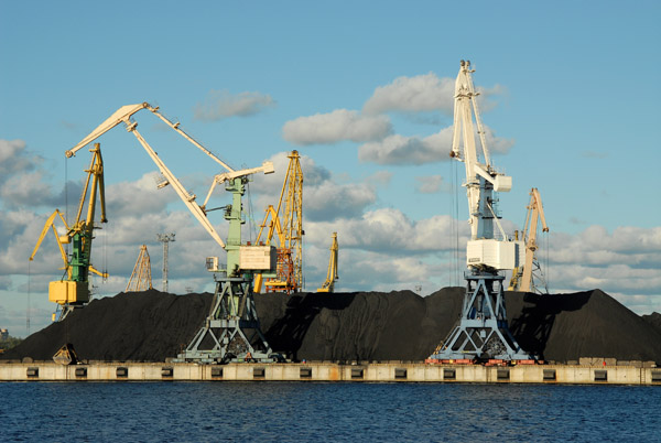 Cranes working coal at the Port of Riga