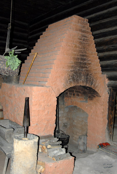 Chimneyless brick fireplace