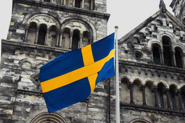 Swedish flag flying in front of Lund Cathedral