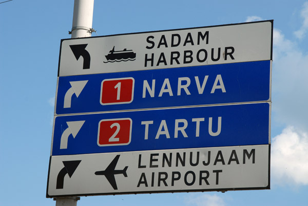 Signs for Sadam Harbour, Narva, Tartu and Tallinn Airport - Lennujaam