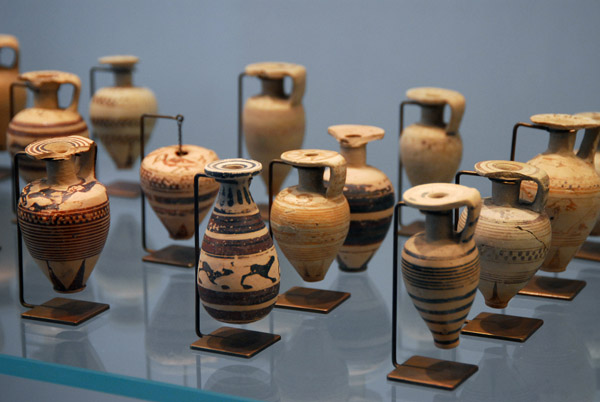 Small ceramic containers for exotic oils used as temple offerings