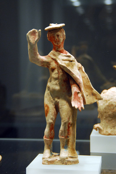 Painted terracotta of standing Hermes with cape and boots, 3rd C. BC