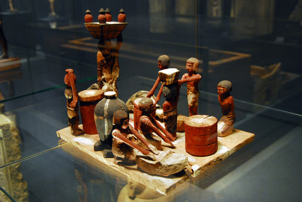 Wooden baking, brewing and butchery scene from the tomb of Wadjet-hotep at Sedment 7-11th Dynasty ca 2150-2050 BC