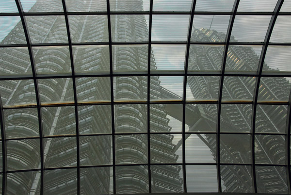 Looking up through the roof of Suria KLCC at Petronas Towers