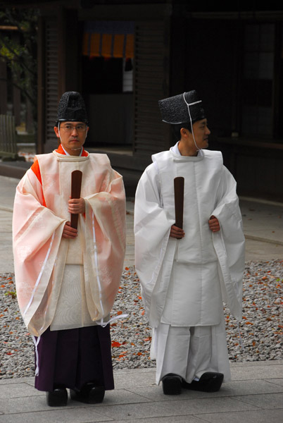 Japanese priests waiting to start a procession