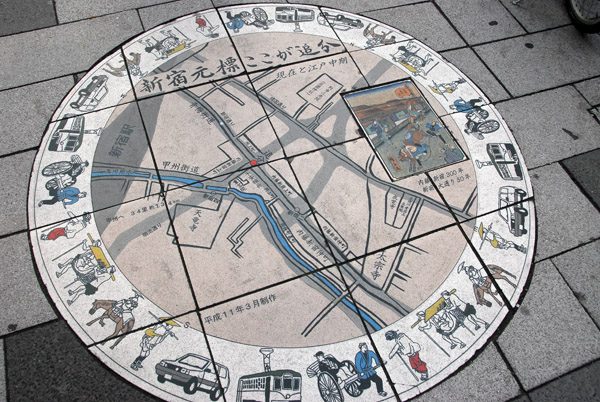 Sidewalk map with historic and modern figures, Shinjuku