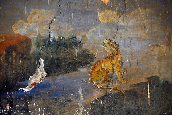 Tiger on a damaged section of the frescoe, Wat Preah Keo