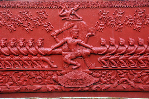 Wall relief of the gods churning the sea of milk story