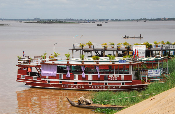 Tourist boat pulled up alongside Sisowath Quay, Phnom Penh