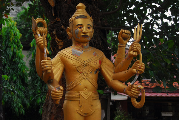 8-armed Vishnu (in need of paint) garden of the Cambodian National Museum