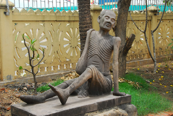 Emaciated figure, Wat Ounalom, Phnom Penh