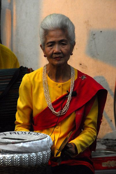 Old Thai woman in one of the music groups