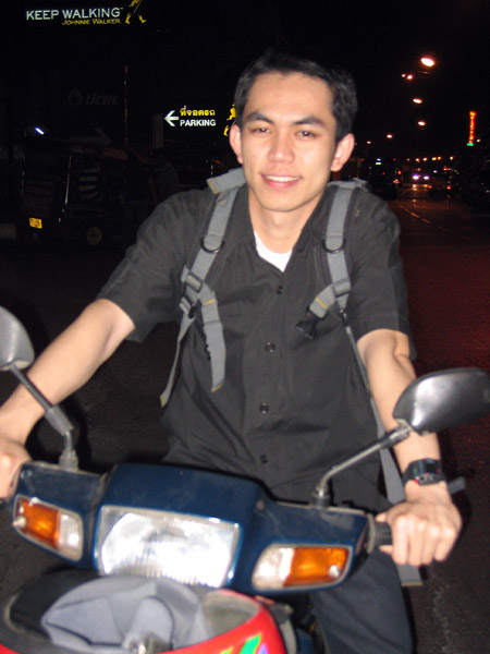 Tan on his motorbike