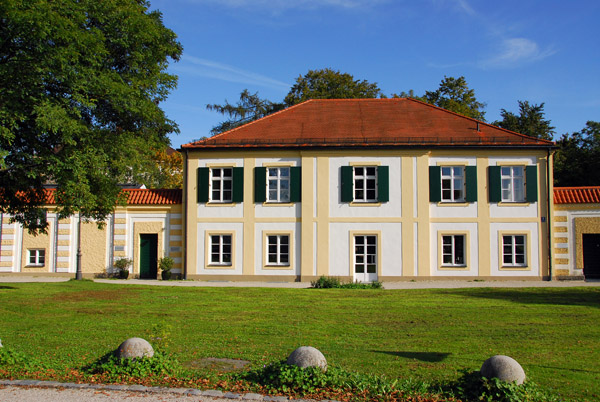 A series of villas form a semicircle to the east of Nymphenburg Castle